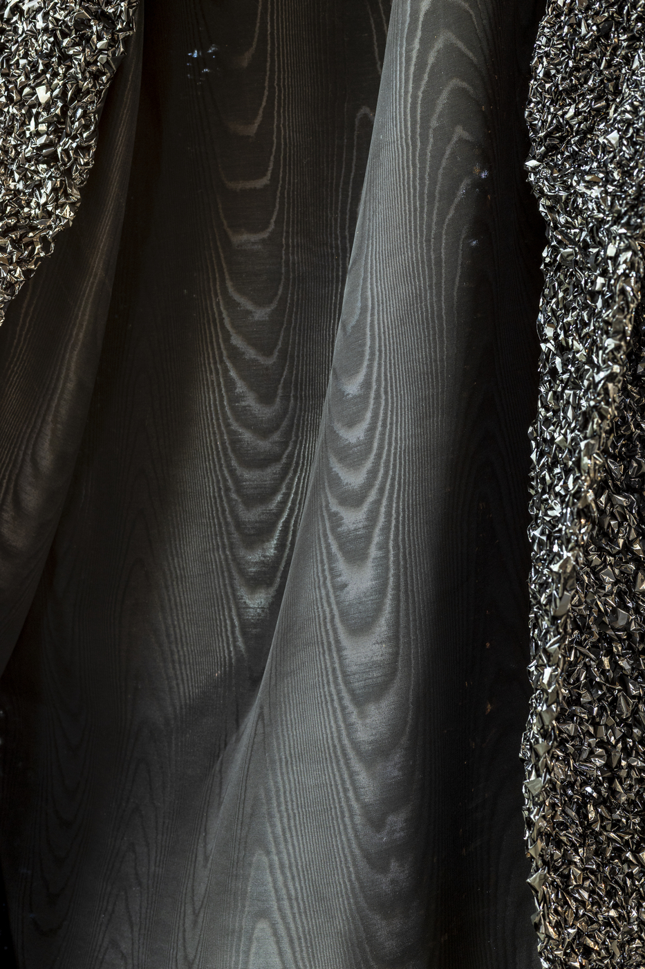 Close-up detail of reflective textile sculpture by Vanessa Enriquez