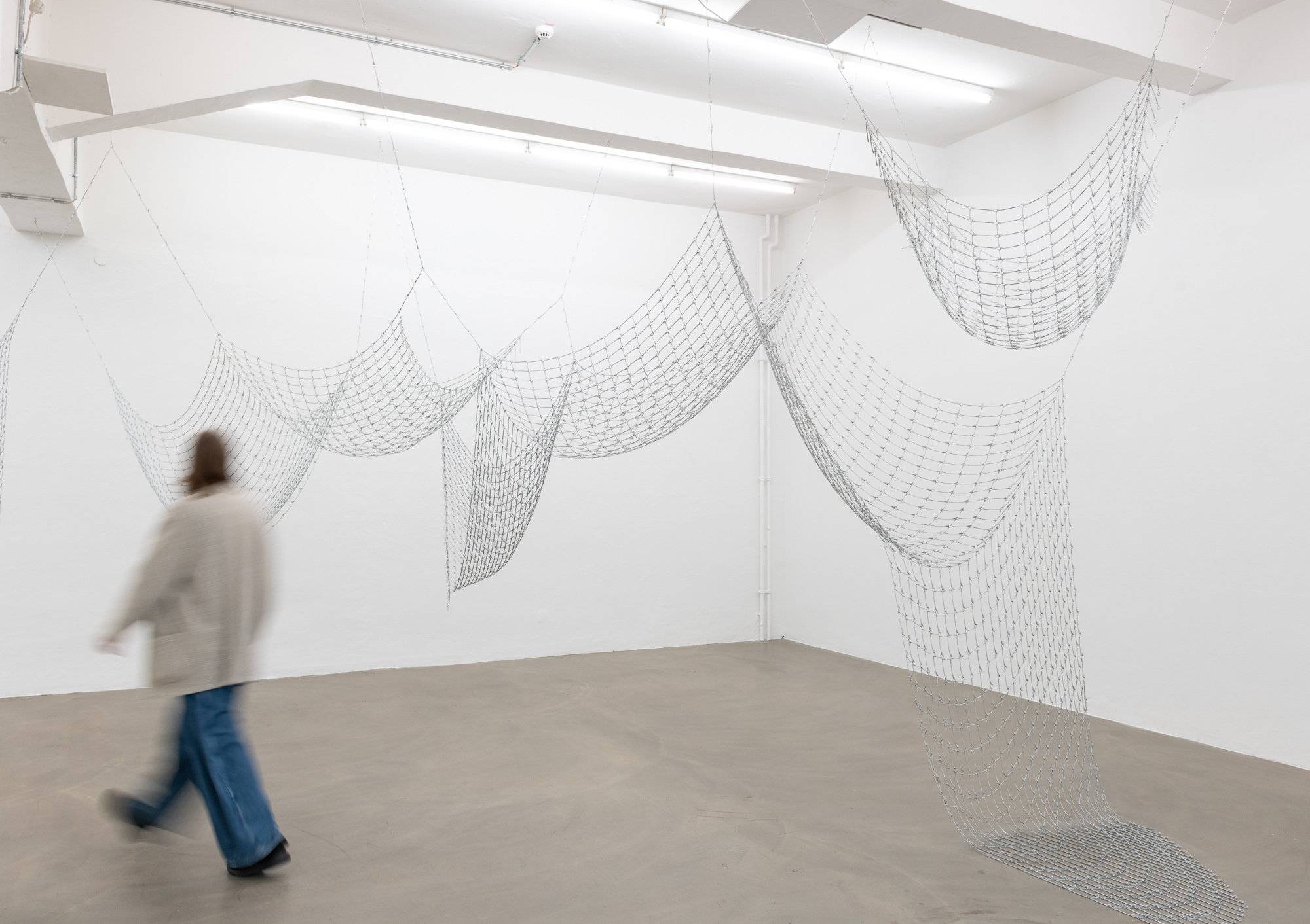 Vanessa Enríquez - Silent Lucidity, spatial drawing with bed spring links